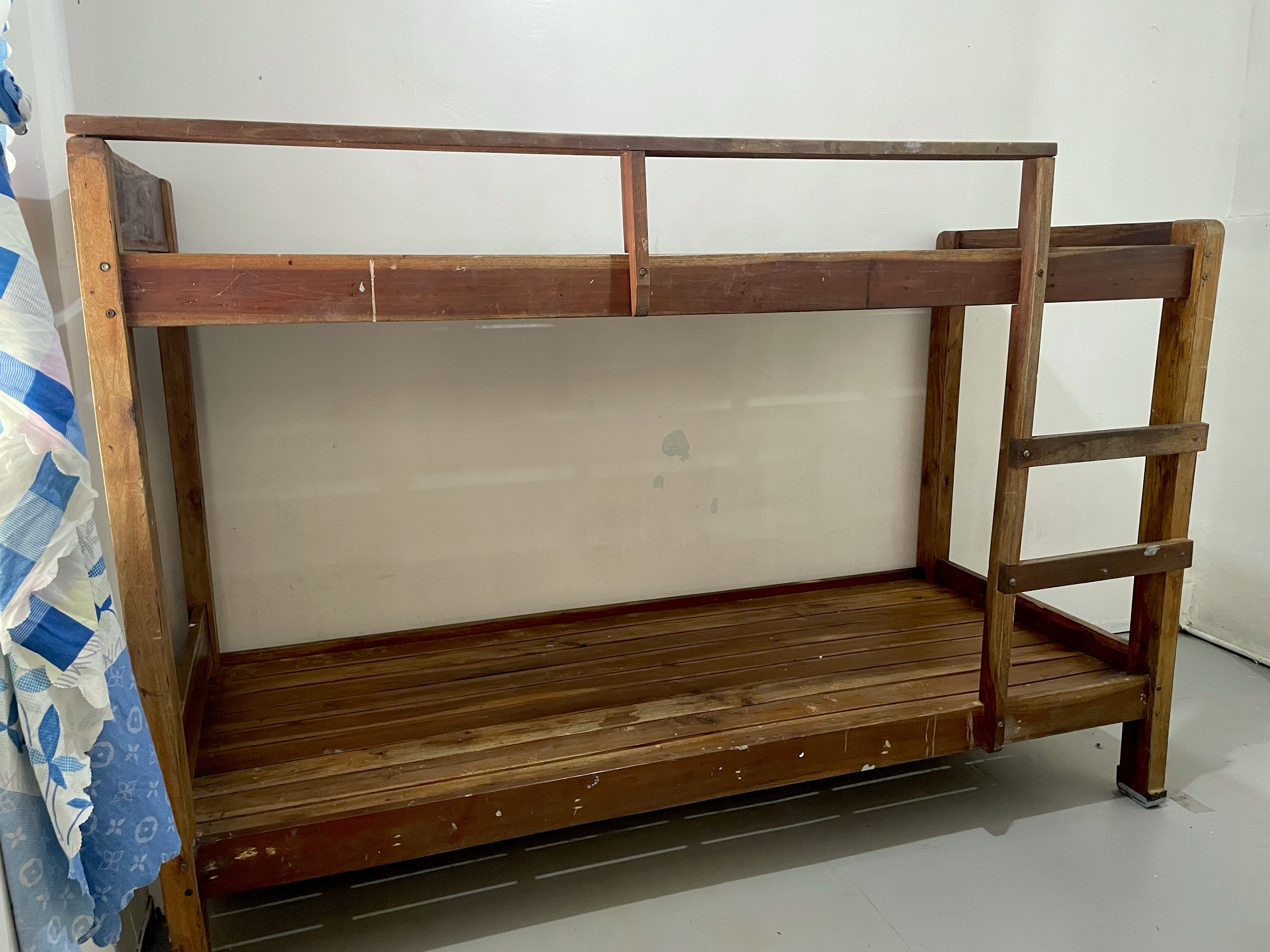 Wooden bunk bed in the shared room